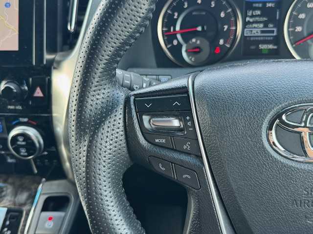 トヨタ ヴェルファイア ゴールデンアイズⅢ 静岡県 2022(令4)年 5.2万km ホワイトパールクリスタルシャイン ●純正ナビ/(Bluetooth)/●ハーフレザーシート/●バックカメラ/●レーダークルーズコントロール/●ブラインドスポットモニター/●衝突被害軽減システム/●レーンキープアシスト/●前後コーナーセンサー/●電動パーキングブレーキ/●オートブレーキホールド/●三眼LEDライト＆フォグランプ/●オートライト/●オートマチックハイビーム/●コンビステアリング/●ステアリングスイッチ/●ETC/●前後ドライブレコーダー/●電動リアゲート/●デジタルインナーミラー/●オットマン/●両側パワースライド/●ドアバイザー/●スマートキー/●プッシュスタート/●純正フロアマット/●純正18インチアルミホイール/●W＋サイド＋ニーSRS＋ABS