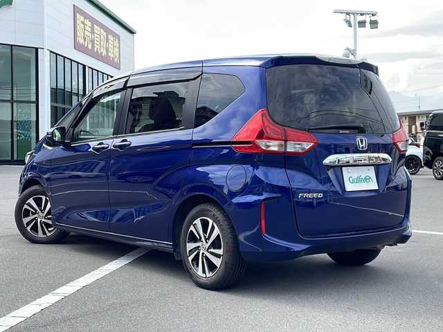 ホンダ フリード G ホンダセンシング 長野県 2017(平29)年 2.3万km コバルトブルーパール ホンダセンシング/・衝突軽減ブレーキ/・アダプティブクルーズコントロール/・車線維持支援システム/・歩行者事故低減ステアリング/・路外逸脱抑制機能/・誤発進抑制機能/・先行車発進お知らせ機能/・標識認識機能/社外8インチメモリナビ【AVIC-RL900】/(CD/DVD/フルセグTV/SD/BT)/バックカメラ/ビルトインETC/ドライブレコーダー/後部座席9インチプライベートモニター【TVM-PW900】/両側パワースライドドア/革巻きステアリング/ステアリングスイッチ/オートライト/スマートキー/Pスタート/電動格納ミラー/純正フロアマット/純正15インチAW/ドアバイザー