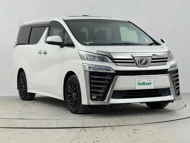 トヨタ ヴェルファイア Z Aエディション 熊本県 2018(平30)年 7.5万km ホワイトパールクリスタルシャイン 純正9型SDナビ【Bluetooth CD DVD SD フルセグ　品番：NSZT-Y66T】/フリップダウンモニター/バックカメラ/ビルトインETC /ドライブレコーダー/WAC/両側パワースライドドア/衝突軽減ブレーキ/レーダークルーズコントロール/レーンキープアシスト/ブレーキホールド/LEDヘッドライト/オートライト/オートマチックハイビーム/フォグランプ/クリアランスソナー/ステアリングリモコン/オットマン/ウォークスルー/オート電度格納ドアミラー/純正ドアバイザー/社外アルミホイール【レオニス製】/禁煙車