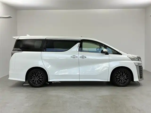 トヨタ ヴェルファイア Z Aエディション 愛知県 2018(平30)年 7.5万km ホワイトパールクリスタルシャイン 純正9型SDナビ【Bluetooth CD DVD SD フルセグ　品番：NSZT-Y66T】/フリップダウンモニター/バックカメラ/ビルトインETC /ドライブレコーダー/WAC/両側パワースライドドア/衝突軽減ブレーキ/レーダークルーズコントロール/レーンキープアシスト/ブレーキホールド/LEDヘッドライト/オートライト/オートマチックハイビーム/フォグランプ/クリアランスソナー/ステアリングリモコン/オットマン/ウォークスルー/オート電度格納ドアミラー/純正ドアバイザー/社外アルミホイール【レオニス製】/禁煙車