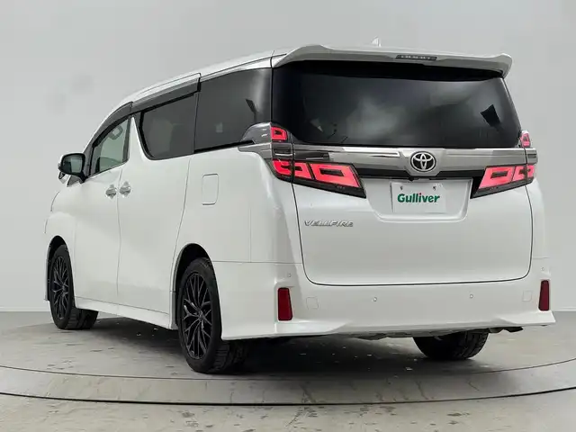 トヨタ ヴェルファイア Z Aエディション 熊本県 2018(平30)年 7.5万km ホワイトパールクリスタルシャイン 純正9型SDナビ【Bluetooth CD DVD SD フルセグ　品番：NSZT-Y66T】/フリップダウンモニター/バックカメラ/ビルトインETC /ドライブレコーダー/WAC/両側パワースライドドア/衝突軽減ブレーキ/レーダークルーズコントロール/レーンキープアシスト/ブレーキホールド/LEDヘッドライト/オートライト/オートマチックハイビーム/フォグランプ/クリアランスソナー/ステアリングリモコン/オットマン/ウォークスルー/オート電度格納ドアミラー/純正ドアバイザー/社外アルミホイール【レオニス製】/禁煙車