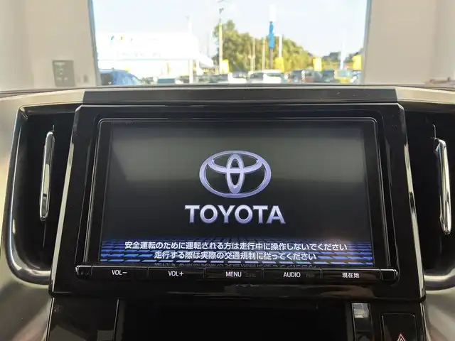 トヨタ ヴェルファイア Z Aエディション 愛知県 2018(平30)年 7.5万km ホワイトパールクリスタルシャイン 純正9型SDナビ【Bluetooth CD DVD SD フルセグ　品番：NSZT-Y66T】/フリップダウンモニター/バックカメラ/ビルトインETC /ドライブレコーダー/WAC/両側パワースライドドア/衝突軽減ブレーキ/レーダークルーズコントロール/レーンキープアシスト/ブレーキホールド/LEDヘッドライト/オートライト/オートマチックハイビーム/フォグランプ/クリアランスソナー/ステアリングリモコン/オットマン/ウォークスルー/オート電度格納ドアミラー/純正ドアバイザー/社外アルミホイール【レオニス製】/禁煙車