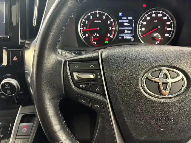 トヨタ ヴェルファイア Z Aエディション 愛知県 2018(平30)年 7.5万km ホワイトパールクリスタルシャイン 純正9型SDナビ【Bluetooth CD DVD SD フルセグ　品番：NSZT-Y66T】/フリップダウンモニター/バックカメラ/ビルトインETC /ドライブレコーダー/WAC/両側パワースライドドア/衝突軽減ブレーキ/レーダークルーズコントロール/レーンキープアシスト/ブレーキホールド/LEDヘッドライト/オートライト/オートマチックハイビーム/フォグランプ/クリアランスソナー/ステアリングリモコン/オットマン/ウォークスルー/オート電度格納ドアミラー/純正ドアバイザー/社外アルミホイール【レオニス製】/禁煙車