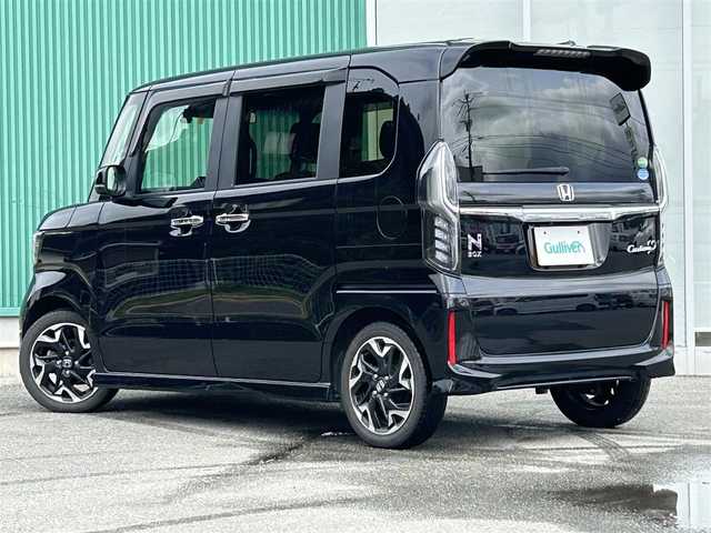 ホンダ Ｎ ＢＯＸ カスタム G L ターボ ホンダセンシング 福岡県 2020(令2)年 5.2万km クリスタルブラックパール 純正8インチSDナビゲーション/(フルセグTV/CD/DVD/BT/USB)/バックカメラ/純正11.6型フリップダウンモニター/両側パワースライドドア/ホンダセンシング/・衝突軽減ブレーキ/・誤発進抑制機能(FR)/・路外逸脱抑制機能/・車線維持支援機能/・アダプティブクルーズコントロール/・オートハイビーム/両側パワースライドドア/純正15インチアルミホイール/革巻きステアリングスイッチ/パドルシフト/ステアリングスイッチ/ETC/ドライブレコーダー(FR)/前席シートヒーター/ハーフレザーシート/LEDヘッドライト/LEDフォグランプ/プッシュスタート/スマートキー/純正フロアマット/純正ドアバイザー