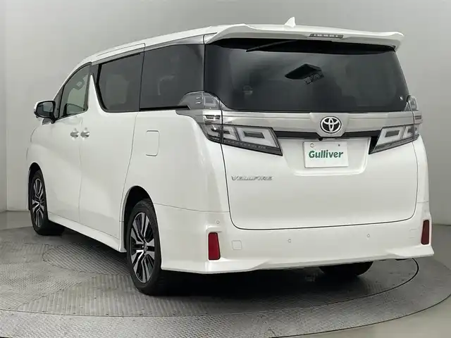 トヨタ ヴェルファイア Z Gエディション 道央・札幌 2019(令1)年 5.9万km ホワイトパールクリスタルシャイン ・4WD/・純正10インチSDナビ（NSZN-Z68T）/　CD/DVD/SD/Bt/USB/HDMI/フルセグ/・フロント、バックカメラ/・純正フリップダウンモニター（前後個別再生）/・両側電動スライドドア/・デジタルインナーミラー/・レーダークルーズコントロール/・プリクラッシュセーフティ/・レーンキープアシスト/・LEDヘッドライト/・オートハイビーム/・ブラインドスポットモニター/・レザーシート/・シートヒーター（D/N）/・ベンチレーション（D/N）/・シートメモリー（D）/・ステアリングヒーター/・オートブレーキホールド/・電動リアゲート/・ビルトインETC（2.0）/・保証書、取説（有）/・スペアキーｘ１
