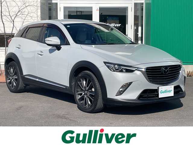 マツダ ＣＸ－３ XD ツーリング Lパッケージ 青森県 2015(平27)年 8万km セラミックM 4WD/寒冷地仕様/イノベーションパッケージ/純正ナビ・フルセグTV/BOSEサウンドシステム/CD・DVD・Bluetooh・USB・/バックカメラ/ハーフレザーシート/前席シートヒーター/衝突軽減ブレーキ/追従クルーズコントロール/車線逸脱警報/誤発進抑制制御/ハイビームコントロール/ヘッドアップディスプレイ/ブラインドスポットモニタリング/パドルシフト/ビルトインETC/LEDヘッドライト/LEDフォグランプ/純正18インチアルミ