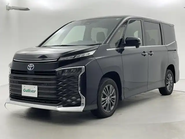 トヨタ ヴォクシー ハイブリッド S－Z 福井県 2023(令5)年 1.9万km アティチュードブラックマイカ 4WD/トヨタセーフティセンス/-プリクラッシュセーフティ/-レーンディパーチャーアラート/-オートマチックハイビーム/-レーダークルーズコントロール/純正10.5型ディスプレイオーディオ/-ナビ/-BT/-Miracast/-フルセグTV/バックカメラ/両側パワースライドドア/LEDオートライト/合皮ハーフレザーシート/シートヒーター/純正16インチアルミホイール/コーナーセンサー/スマートキー/ETC2.0