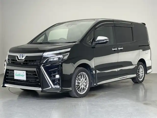トヨタ ヴォクシー ハイブリッド ZS 煌Ⅲ 愛知県 2020(令2)年 3.8万km イナズマスパーキングブラックガラスフレーク アルパイン９型ナビ　アルパインフリップダウンモニター　シートヒーター　禁煙車　ＨＤＭＩ　両側パワースライドドア　ＥＴＣ　バックカメラ　オートハイビーム　ＬＥＤオートライト　フォグ　コーナーセンサー　衝突軽減　車線逸脱　クルコン　セーフティセンス　　ハーフレザーシート　