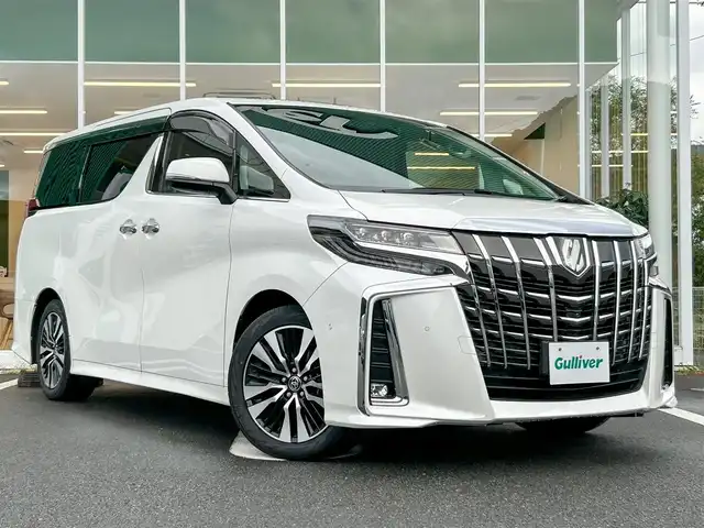 トヨタ アルファード S Cパッケージ 愛媛県 2020(令2)年 3.1万km ホワイトパールクリスタルシャイン JBLプレミアムサウンド/純正9.8インチナビ/Bluetooth・Miracast・フルセグTV/パノラミックビューモニター/後席リアエンターテイメントシステム/ダブルムーンルーフ/デジタルインナーミラー/3眼LEDヘッドライト/ステアリングヒーター/ビルトインETC2.0/前後ドライブレコーダー/レーダー探知機/パワーシート/前席シートヒーター/前席ベンチレーション/プリクラッシュセーフティ/レーントレーシングアラート/パーキングサポートブレーキ/クリアランスソナー/ブラインドスポットモニター/リアクロストラフィックアラート/ロードサインアシスト/アダプティブクルーズコントロール/オートマチックヘッドライト/フォグランプ/オートハイビーム/純正18インチアルミホイール/禁煙車