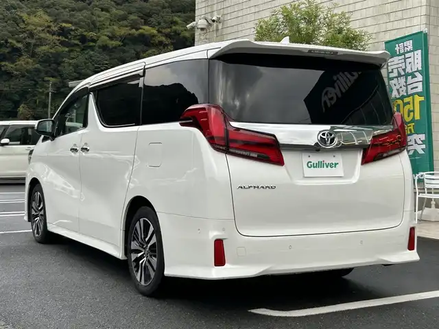 トヨタ アルファード S Cパッケージ 愛媛県 2020(令2)年 3.1万km ホワイトパールクリスタルシャイン JBLプレミアムサウンド/純正9.8インチナビ/Bluetooth・Miracast・フルセグTV/パノラミックビューモニター/後席リアエンターテイメントシステム/ダブルムーンルーフ/デジタルインナーミラー/3眼LEDヘッドライト/ステアリングヒーター/ビルトインETC2.0/前後ドライブレコーダー/レーダー探知機/パワーシート/前席シートヒーター/前席ベンチレーション/プリクラッシュセーフティ/レーントレーシングアラート/パーキングサポートブレーキ/クリアランスソナー/ブラインドスポットモニター/リアクロストラフィックアラート/ロードサインアシスト/アダプティブクルーズコントロール/オートマチックヘッドライト/フォグランプ/オートハイビーム/純正18インチアルミホイール/禁煙車