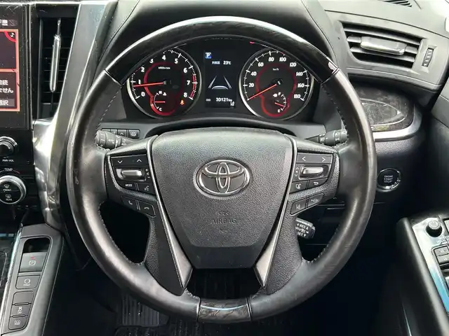 トヨタ アルファード S Cパッケージ 愛媛県 2020(令2)年 3.1万km ホワイトパールクリスタルシャイン JBLプレミアムサウンド/純正9.8インチナビ/Bluetooth・Miracast・フルセグTV/パノラミックビューモニター/後席リアエンターテイメントシステム/ダブルムーンルーフ/デジタルインナーミラー/3眼LEDヘッドライト/ステアリングヒーター/ビルトインETC2.0/前後ドライブレコーダー/レーダー探知機/パワーシート/前席シートヒーター/前席ベンチレーション/プリクラッシュセーフティ/レーントレーシングアラート/パーキングサポートブレーキ/クリアランスソナー/ブラインドスポットモニター/リアクロストラフィックアラート/ロードサインアシスト/アダプティブクルーズコントロール/オートマチックヘッドライト/フォグランプ/オートハイビーム/純正18インチアルミホイール/禁煙車