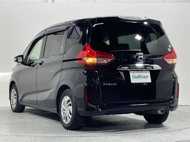 ホンダ フリード G ホンダセンシング 大阪府 2017(平29)年 3万km クリスタルブラックパール 純正ナビ　衝突軽減Ｂ　両側電動ドア　レーダークルーズＣ　バックカメラ　レーンアシスト　プッシュスタート　ベンチシート　ＥＴＣ　スマートキー　オートライト　Ｂｌｕｅｔｏｏｔｈ　ＣＤ／ＤＶＤ／フルセグＴＶ