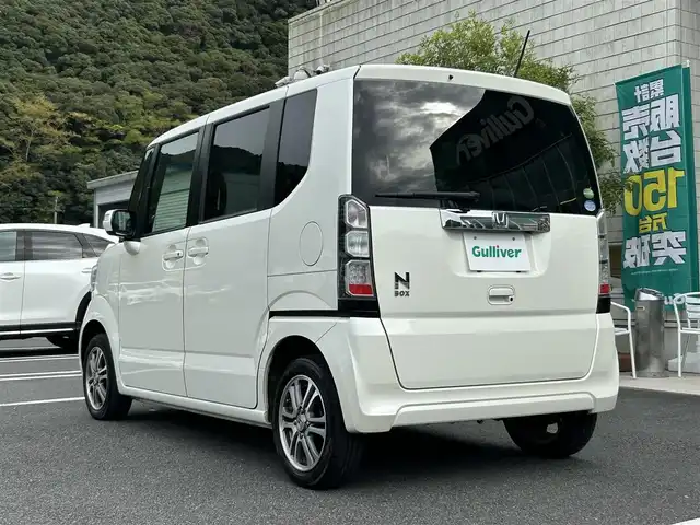 ホンダ Ｎ ＢＯＸ G Lパッケージ 愛媛県 2013(平25)年 6.9万km プレミアムホワイトパール 純正メモリナビ（VXM-128VS）/・CD/・USB入力端子/ワンセグTV/バックカメラ/パワースライドドア/純正14インチAW/純正フロアマット/スマートキー/スペアキー/取扱説明書