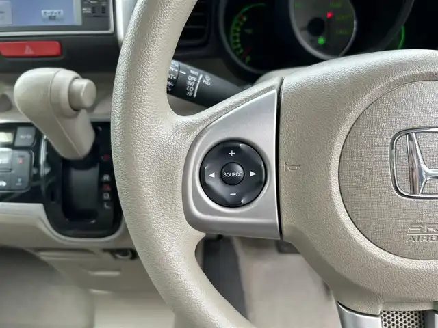 ホンダ Ｎ ＢＯＸ G Lパッケージ 愛媛県 2013(平25)年 6.9万km プレミアムホワイトパール 純正メモリナビ（VXM-128VS）/・CD/・USB入力端子/ワンセグTV/バックカメラ/パワースライドドア/純正14インチAW/純正フロアマット/スマートキー/スペアキー/取扱説明書