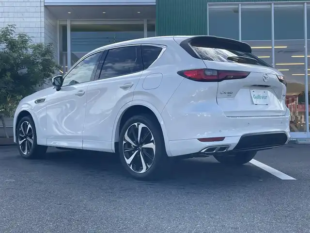 マツダ ＣＸ－６０ XD HV エクスクルーシブモダン 岡山県 2022(令4)年 3.5万km ロジウムホワイトプレミアムメタリック 12.3インチディスプレイ/フルセグTV、AM、FM、Bluetooth/AppleCarplay、AndroidAuto/BOSEサウンドシステム/白色ナッパレザー/アダブティブLEDヘッドライト/全方位モニター/レーンキープアシスト/緊急時車線維持支援/ブラインドスポットモニタリング/スマートブレーキサポート/・前方検知機能/・右直事故回避アシスト機能/・前進時左右接近物検知機能/・交差点事故回避アシスト機能/・後退時検知機能/・後退時左右接近物検知機能/前側方接近車両検知/マツダレーダークルーズコントロール/交通標識認識システム/クルージングトラフィックサポート/ドライバー異常時対応システム/ドライバーモニタリング/デイタイムランニングライト/ハンズフリー機能付きパワーリフトゲート/アクティブドライビングディスプレイ/アンビエントライト/12.3インチフル液晶メーター/運転席メモリーシート/前席シートヒーター/ステアリングヒーターF/前席ベンチレーション/前席パワーシート/USB端子　HDMI端子/ワイヤレス充電
