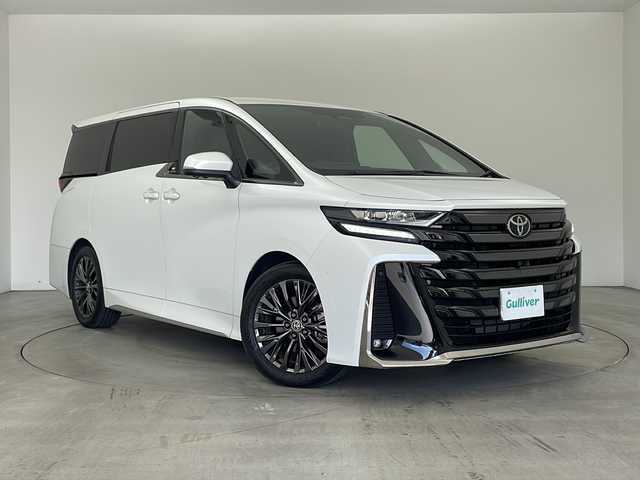 トヨタ ヴェルファイア ハイブリット Z プレミア 兵庫県 2023(令5)年 2万km プラチナホワイトパールマイカ ・純正ディスプレイオーディオ/・Bluetooth/USB/HDMI/TV/・パノラミックビューモニター/・トヨタセーフティセンス/・プリクラッシュセーフティ/・レーンディバーチャーアラート/・レーダクルーズコントロール/・アダプティブハイビームシステム/・ロードサインアシスト/・ドライバー異常時対応システム/・プロアクティブドライビングアシスト/・発進遅れ告知機能/・ブラインドスポットモニター/・フロントクロストラフィックアラート/・レーンチェンジアシスト/・安心降車アシスト/・パーキングサポートブレーキ/・両側パワースライドドア/・デジタルインナーミラー/・ムーンルーフ/・ステアリングヒーター/・パドルシフト/・レザーシート/・前席パワーシート/・前席シートヒーター/・前席ベンチレーション/・置くだけ充電/・LEDヘッドライト/・純正19インチアルミホイールタイヤ/・ビルトインETC2.0