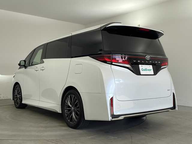 トヨタ ヴェルファイア ハイブリット Z プレミア 兵庫県 2023(令5)年 2万km プラチナホワイトパールマイカ ・純正ディスプレイオーディオ/・Bluetooth/USB/HDMI/TV/・パノラミックビューモニター/・トヨタセーフティセンス/・プリクラッシュセーフティ/・レーンディバーチャーアラート/・レーダクルーズコントロール/・アダプティブハイビームシステム/・ロードサインアシスト/・ドライバー異常時対応システム/・プロアクティブドライビングアシスト/・発進遅れ告知機能/・ブラインドスポットモニター/・フロントクロストラフィックアラート/・レーンチェンジアシスト/・安心降車アシスト/・パーキングサポートブレーキ/・両側パワースライドドア/・デジタルインナーミラー/・ムーンルーフ/・ステアリングヒーター/・パドルシフト/・レザーシート/・前席パワーシート/・前席シートヒーター/・前席ベンチレーション/・置くだけ充電/・LEDヘッドライト/・純正19インチアルミホイールタイヤ/・ビルトインETC2.0