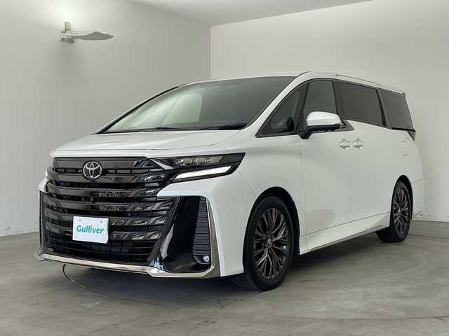 トヨタ ヴェルファイア ハイブリット Z プレミア 兵庫県 2023(令5)年 2万km プラチナホワイトパールマイカ ・純正ディスプレイオーディオ/・Bluetooth/USB/HDMI/TV/・パノラミックビューモニター/・トヨタセーフティセンス/・プリクラッシュセーフティ/・レーンディバーチャーアラート/・レーダクルーズコントロール/・アダプティブハイビームシステム/・ロードサインアシスト/・ドライバー異常時対応システム/・プロアクティブドライビングアシスト/・発進遅れ告知機能/・ブラインドスポットモニター/・フロントクロストラフィックアラート/・レーンチェンジアシスト/・安心降車アシスト/・パーキングサポートブレーキ/・両側パワースライドドア/・デジタルインナーミラー/・ムーンルーフ/・ステアリングヒーター/・パドルシフト/・レザーシート/・前席パワーシート/・前席シートヒーター/・前席ベンチレーション/・置くだけ充電/・LEDヘッドライト/・純正19インチアルミホイールタイヤ/・ビルトインETC2.0