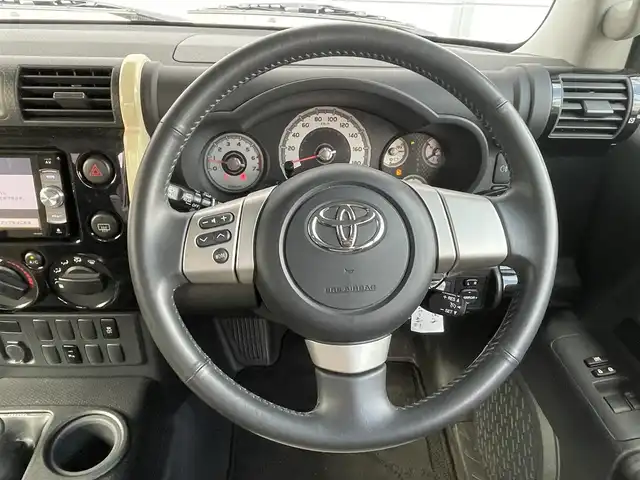 トヨタ ＦＪクルーザー ファイナルエディション 千葉県 2017(平29)年 5.4万km ベージュ 専用ボディ色/ブラックメッシュグリル/ブラックバンパー/ブラックミラー/ヒーター付き/サイドステップ/ルーフキャリア/TRD16インチAW/クルーズコントロール/社外メモリナビ(AVIC-RW901)/・フルセグ/BT/DVD/CD/バックカメラ/コーナーセンサー(後)/ETC/キーレスエントリー/純正フロアマット/純正AW車載(タイヤ付き)