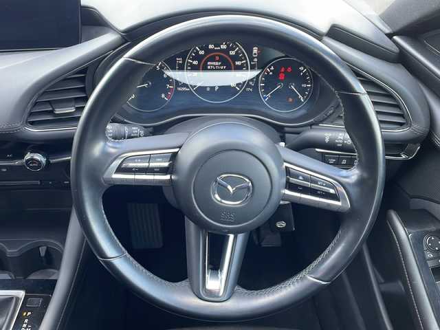 マツダ マツダ３ファストバック 15S ツーリング 新潟県 2020(令2)年 1.7万km ポリメタルグレーM 純正メモリナビ/(Bluetooth/AM/FM/CD/DVD)/フルセグTV/クルーズコントロール/バックカメラ/衝突軽減システム/ブラインドスポットアシスト/純正AW付サマータイヤ/純正フロアマット/LEDヘッドライト/LEDフォグライト/ステアリングスイッチ/電動格納ミラー