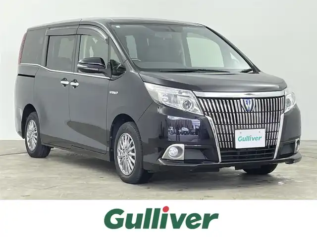 トヨタ エスクァイア ハイブリッド Gi 千葉県 2014(平26)年 6.6万km スパークリングブラックパールクリスタルシャイン 両側電動ドア/クルーズコントロール/社外9インチメモリナビ/・型番：CN-F1D/・CD/DVD/Blu-ray/Bluetooth/フルセグTV/・バックカメラ/・ビルトインETC/革巻きステアリング/・ステアリングスイッチ/レザーシート/・DNシートヒーター/左右独立エアコン/置くだけ充電/純正フロアマット/純正15インチAW/オートライト/・LEDヘッドライト/・フォグランプ