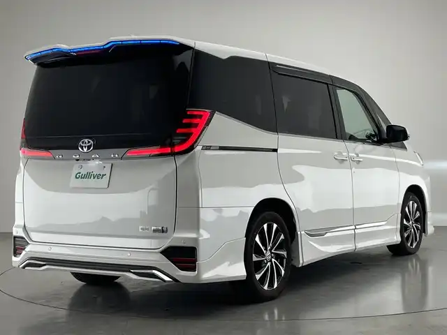 トヨタ ノア ハイブリッド S－Z 愛知県 2023(令5)年 1.2万km ホワイトパールクリスタルシャイン 純正１０．５型ナビ　モデリスタ　快適利便Ｈｉｇｈ　禁煙　バックカメラ　ＤＶＤ　前後ドラレコ　ＡＣ１００Ｖ　ＥＴＣ２．０　シートヒーター　衝突軽減　追従クルコン　ＢＳＭ　ＬＥＤライト　アドバンスドドライブ　モデリスタシグネチャーイルミ　パワーバックドア　オットマン　ハーフレザー　USBポート