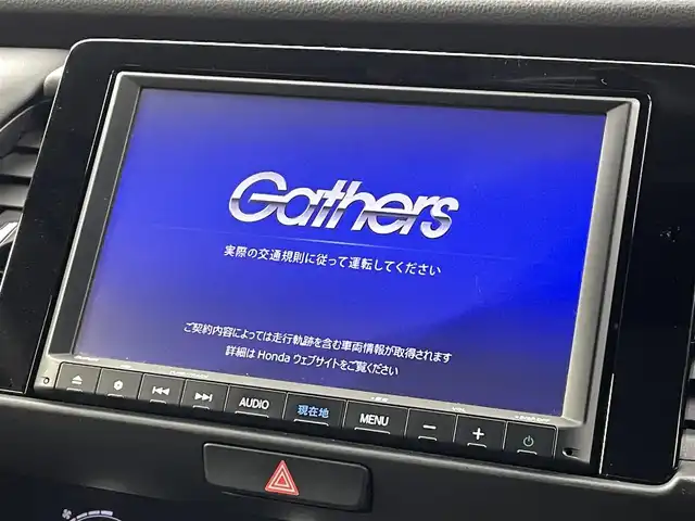 ホンダ フィット e:HEVホーム 福島県 2021(令3)年 5.9万km ライトブルー ホンダセンシング/・衝突軽減ブレーキ/・誤発進抑制機能/・後方誤発進抑制機能/・近距離衝突軽減ブレーキ/・路外逸脱抑制機能/・渋滞追従機能付アダプティブ・クルーズ・コントロール/・車線維持支援システム/・先行車発進お知らせ機能/・標識認識機能/コンフォートビューパッケージ/・親水/ヒーテッドドアミラー/・熱線入りフロントウインドウ/・PTCヒーター /純正ナビゲーション/・型式：VXM-205VFEi/・【TV/Bluetooth/CD/DVD/AM・FM/・バックカメラ/・ETC/前後ドライブレコーダー/プッシュスタート/・スマートキー/・電子パーキング/・オートホールド/革巻きステアリング/・ステアリングスイッチ/LEDヘッドライト/・オートライト/・オートハイビーム/・ヘッドライトリベライザー/純正フロアマット/電動格納ウィンカーミラー/ドアバイザー