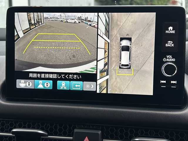 ホンダ ＺＲ－Ｖ ハイブリッド e:HEV Z 山形県 2023(令5)年 1.1万km スーパープラチナグレーメタリック 禁煙車/４WD/ホンダセンシング/クルーズコントロール/ブラインドスポットモニター/横滑り防止装置/レーンキープアシスト/オートマチックハイビーム/全方位カメラ/前後コーナーセンサー/BOSEサウンド/純正ナビ/（Bluetooth/フルセグ/AM/FM/USB)/置くだけ充電/ETC2.0/ステアリングスイッチ/パドルシフト/ステアリングヒーター/本革シート/前席パワーシート/D席シートメモリー/全席シートヒーター/純正フロアマット/無限ドアプロテクター/スマートキー×２/18インチ純正アルミホイール