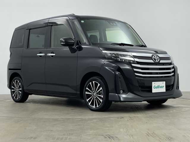 トヨタ ルーミー カスタムG－T 鹿児島県 2021(令3)年 0.3万km ブラックマイカメタリック スマートアシスト/純正SDナビ(BT/AM/FM/フルセグTV)/NSZT-Y68T/両側パワースライドドア/ワンオーナー/レーダークルーズコントロール/バックカメラ/全方位カメラ/前後ドライブレコーダー/前後コーナーセンサー/レーンキープアシスト/オートマチックハイビーム/電動パーキングブレーキ/オートホールド/ビルトインETC/革巻きステアリング/ステアリングスイッチ/純正フロアマット/純正15インチアルミホイール/保証書/取扱説明書