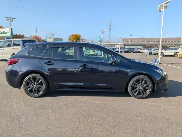 トヨタ カローラツーリング ハイブリッド ダブルバイビー 福井県 2020(令2)年 4.3万km スパークリングブラックパールクリスタルシャイン 純正9インチナビ/AM/FM/BT/USB/Miracast/バックカメラ/全車速追従機能付クルーズコントロール/コーナーセンサー/トヨタセーフティセンス/BSM/RCTA/RSA/１００V充電/ビルトインETC/シートヒーター/SOSボタン/ステアリングヒーター/純正フロアマット/オートホールド/純正17インチAW/LEDヘッドライト/Fフォグ/スマートキー