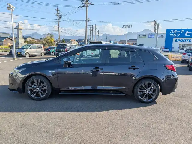 トヨタ カローラツーリング ハイブリッド ダブルバイビー 福井県 2020(令2)年 4.3万km スパークリングブラックパールクリスタルシャイン 純正9インチナビ/AM/FM/BT/USB/Miracast/バックカメラ/全車速追従機能付クルーズコントロール/コーナーセンサー/トヨタセーフティセンス/BSM/RCTA/RSA/１００V充電/ビルトインETC/シートヒーター/SOSボタン/ステアリングヒーター/純正フロアマット/オートホールド/純正17インチAW/LEDヘッドライト/Fフォグ/スマートキー