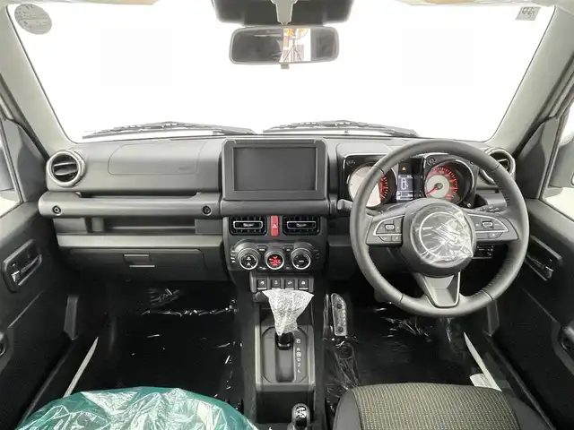 スズキ ジムニー ノマド FC 千葉県 2025(令7)年 0.1千km アークティックホワイトパール 禁煙車/登録済未使用車/４WD/・ダウンヒルアシストコントロール/スズキセーフティサポート/・デュアルセンサーブレーキサポート/・先行車発進お知らせ/・標識認識機能/・アダプティブクルーズコントロール/・車線逸脱警報機能/・ふらつき警報機能/・誤発進抑制機能/・後方誤発進抑制/・後退時ブレーキサポート/・コーナーセンサー/前席シートヒーター/革巻きステアリング/・ステアリングスイッチ/純正１５インチAW/オートライト/・オートマチックハイビーム/・LEDヘッドライト/・フォグランプ