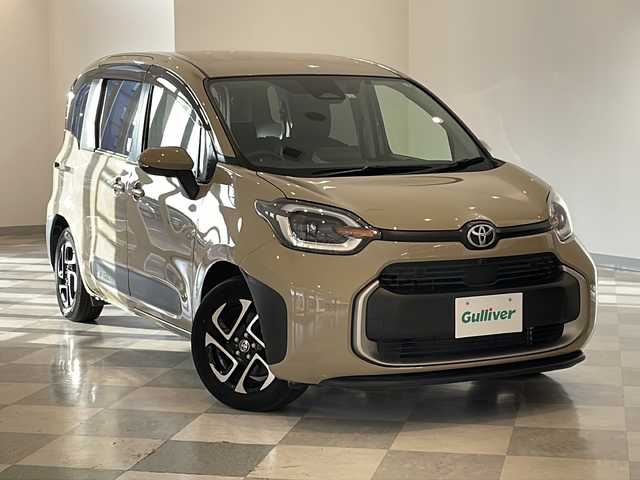 トヨタ シエンタ ハイブリッド Z 福井県 2022(令4)年 2.5万km ベージュ ワンオーナー/純正10.5インチコネクティッドナビ/フルセグTV/BT/DVD/CD/USB/パノラミックビューモニター/純正フリップダウンモニター(V12T-R72C)/セーフティセンス/・レーダークルーズコントロール/・ブラインドスポットモニター/・レーンディパーチャーアラート/・プリクラッシュセーフティ/・緊急時操舵支援機能/・プロアクティブドライビングアシスト/・ロードサインアシスト/・アダプティブハイビームシステム/ドライブレコーダー/ビルトインETC/両側パワースライドドア/純正15インチアルミホイール/オートライト/LEDヘッドライト/100V電源/ステアリングスイッチ