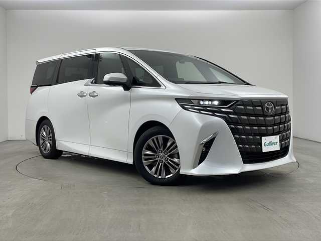 トヨタ アルファードハイブリット Z 兵庫県 2023(令5)年 1.3万km プラチナホワイトパールマイカ ・純正14インチディスプレイオーディオplus/TV/USB/Bluetooth/Miracast/・パノラミックビューモニター/・ビルトインETC2.0/・デジタルインナーミラー/・前後ドライブレコーダー/・両側パワースライドドア/・パワーバックドア/・左右独立ムーンルーフ/・Toyota　Safety　Sense/プリクラッシュセーフティ/レーントレーシングアシスト/レーンディパーチャーアラート/レーダークルーズコントロール（全車速追従機能付）/アダプティブハイビームシステム/ロードサインアシスト/ドライバー異常時対応システム/プロアクティブドライビングアシスト/発進遅れ告知機能/・ブラインドスポットモニター/・安心降車アシスト/・後方車両接近告知/・周辺車両接近時サポート/・後方車両への接近警報/・ユニバーサルステップ/・置くだけ充電/・AC100V電源/・合成皮革シート/・1、2列目シートヒーター/・1，2列目ベンチレーション/・ステアリングヒーター/・前席パワーシート/・3眼LEDヘッドライト/・プッシュスタート/・スマートキー/・純正18インチ」アルミホイール