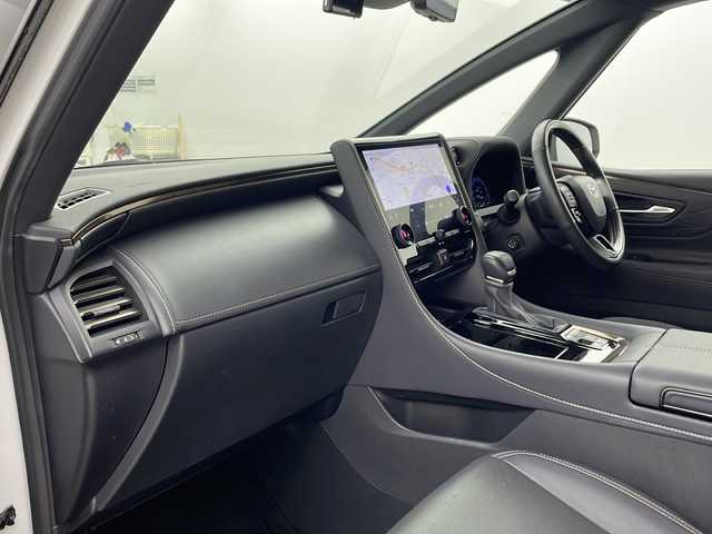 トヨタ アルファードハイブリット Z 兵庫県 2023(令5)年 1.3万km プラチナホワイトパールマイカ ・純正14インチディスプレイオーディオplus/TV/USB/Bluetooth/Miracast/・パノラミックビューモニター/・ビルトインETC2.0/・デジタルインナーミラー/・前後ドライブレコーダー/・両側パワースライドドア/・パワーバックドア/・左右独立ムーンルーフ/・Toyota　Safety　Sense/プリクラッシュセーフティ/レーントレーシングアシスト/レーンディパーチャーアラート/レーダークルーズコントロール（全車速追従機能付）/アダプティブハイビームシステム/ロードサインアシスト/ドライバー異常時対応システム/プロアクティブドライビングアシスト/発進遅れ告知機能/・ブラインドスポットモニター/・安心降車アシスト/・後方車両接近告知/・周辺車両接近時サポート/・後方車両への接近警報/・ユニバーサルステップ/・置くだけ充電/・AC100V電源/・合成皮革シート/・1、2列目シートヒーター/・1，2列目ベンチレーション/・ステアリングヒーター/・前席パワーシート/・3眼LEDヘッドライト/・プッシュスタート/・スマートキー/・純正18インチ」アルミホイール