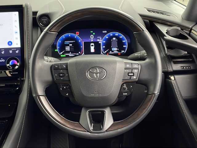 トヨタ アルファードハイブリット Z 兵庫県 2023(令5)年 1.3万km プラチナホワイトパールマイカ ・純正14インチディスプレイオーディオplus/TV/USB/Bluetooth/Miracast/・パノラミックビューモニター/・ビルトインETC2.0/・デジタルインナーミラー/・前後ドライブレコーダー/・両側パワースライドドア/・パワーバックドア/・左右独立ムーンルーフ/・Toyota　Safety　Sense/プリクラッシュセーフティ/レーントレーシングアシスト/レーンディパーチャーアラート/レーダークルーズコントロール（全車速追従機能付）/アダプティブハイビームシステム/ロードサインアシスト/ドライバー異常時対応システム/プロアクティブドライビングアシスト/発進遅れ告知機能/・ブラインドスポットモニター/・安心降車アシスト/・後方車両接近告知/・周辺車両接近時サポート/・後方車両への接近警報/・ユニバーサルステップ/・置くだけ充電/・AC100V電源/・合成皮革シート/・1、2列目シートヒーター/・1，2列目ベンチレーション/・ステアリングヒーター/・前席パワーシート/・3眼LEDヘッドライト/・プッシュスタート/・スマートキー/・純正18インチ」アルミホイール