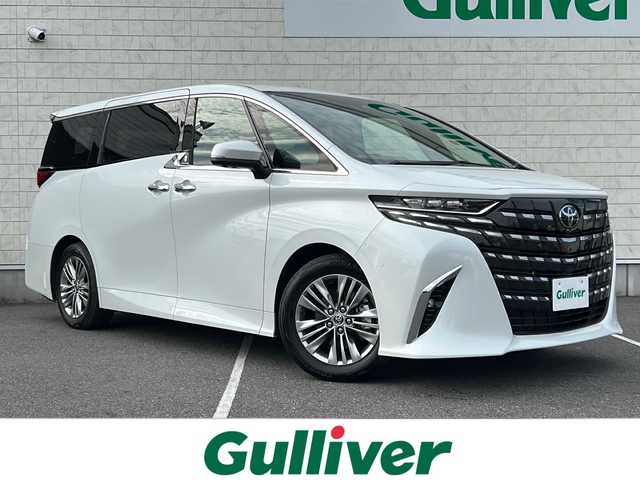 トヨタ アルファードハイブリット Z 栃木県 2024(令6)年 0.8万km プラチナホワイトパールマイカ 純正メモリナビ/・Bluetooth/・TV フルセグ/・アラウンドビューモニター/左右独立ダブルムーンルーフ/追従式クルーズコントロール/デジタルインナーミラー/レザーシート/パワーシート/シートヒーター/シートクーラー/両側パワースライドドア/電動リアサンシェード/ETC2.0/ドライブレコーダー/衝突被害軽減システム/コーナーセンサー/レーンキープアシスト/LEDヘッドライト/オートライト/オートマチックハイビーム/BSM/１００V充電