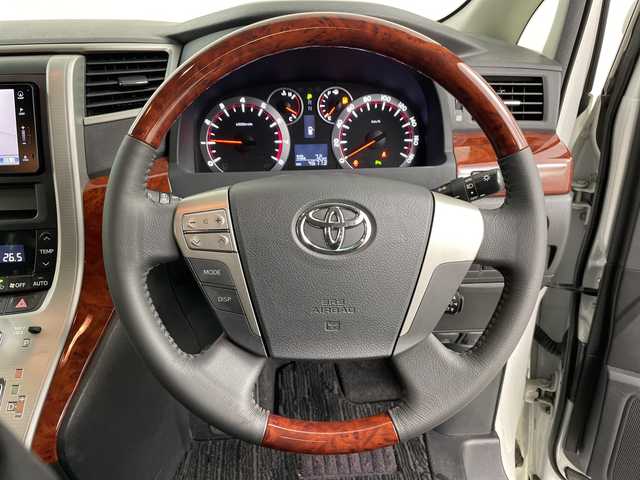 トヨタ ヴェルファイア 2．4Z プラチナセレクションⅡ 道央・札幌 2011(平23)年 4.7万km ホワイトパールクリスタルシャイン ・4WD/寒冷地仕様/・純正ディーラーOPナビ  /・フルセグ/BT/DVD/CD/SD/・バックカメラ/・純正フリップダウンモニター/・両側パワースライドドア/・パワーバックドア/・HIDオートライト/・フォグランプ/・スマートキー×2/・純正17インチAW/・前方ドライブレコーダー/・ETC