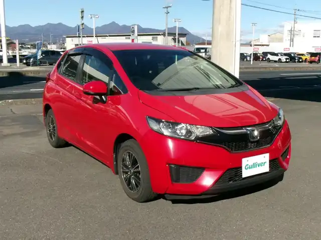 ホンダ フィット 13G Fパッケージ 群馬県 2016(平28)年 5.1万km ミラノレッド ワンオーナー/社外メモリーナビ・フルセグTV/ ・BT・DVD(AVIC-RZ07)/バックモニター/社外ドライブレコーダー/社外ETC/純正フロント・リアセンサー/純正LEDヘッドライト/社外14インチアルミホイール/オートリトラミラー/スマートキー×2＆プッシュスタート/保証書＆取説