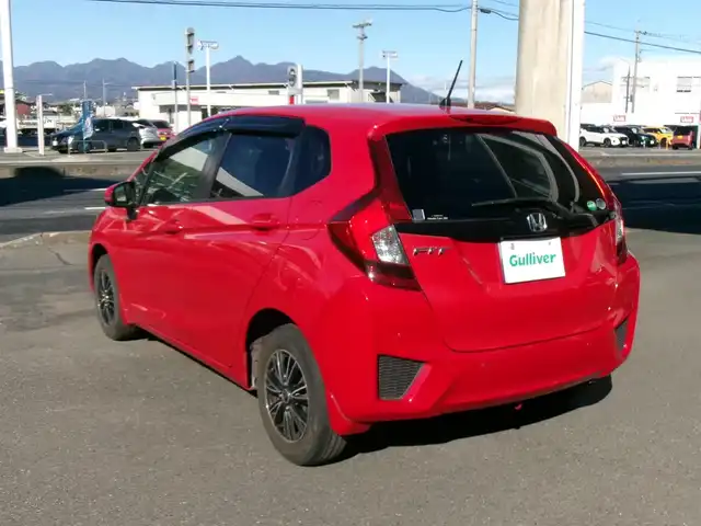 ホンダ フィット 13G Fパッケージ 群馬県 2016(平28)年 5.1万km ミラノレッド ワンオーナー/社外メモリーナビ・フルセグTV/ ・BT・DVD(AVIC-RZ07)/バックモニター/社外ドライブレコーダー/社外ETC/純正フロント・リアセンサー/純正LEDヘッドライト/社外14インチアルミホイール/オートリトラミラー/スマートキー×2＆プッシュスタート/保証書＆取説