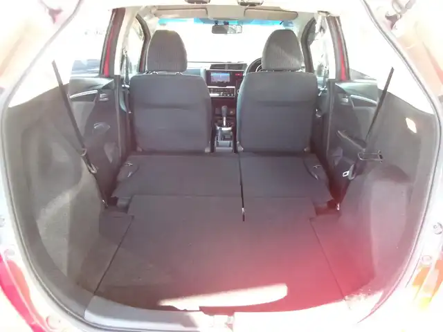 ホンダ フィット 13G Fパッケージ 群馬県 2016(平28)年 5.1万km ミラノレッド ワンオーナー/社外メモリーナビ・フルセグTV/ ・BT・DVD(AVIC-RZ07)/バックモニター/社外ドライブレコーダー/社外ETC/純正フロント・リアセンサー/純正LEDヘッドライト/社外14インチアルミホイール/オートリトラミラー/スマートキー×2＆プッシュスタート/保証書＆取説