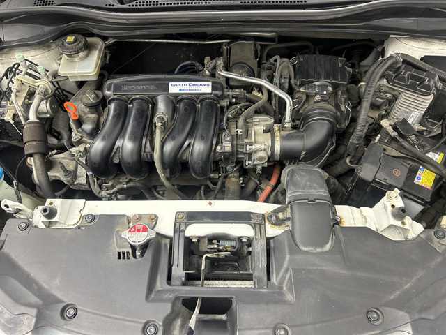 ホンダ ヴェゼル ハイブリッド X 福島県 2014(平26)年 12.6万km ホワイトオーキッドパール /禁煙車//４ＷＤ//シートヒーター//パドルシフト//純正ナビ/ワンセグTV・CD・DVD・BT//バックカメラ//アルミ付きサマータイヤ積込//クルーズコントロール//純正ＬＥＤライト//電動パーキングブレーキ//ステアリングリモコン//フォグライト//スマートキー2本//取扱説明書//保証書