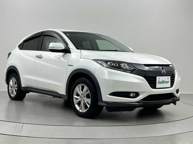 ホンダ ヴェゼル ハイブリッド X 福島県 2014(平26)年 12.6万km ホワイトオーキッドパール /禁煙車//４ＷＤ//シートヒーター//パドルシフト//純正ナビ/ワンセグTV・CD・DVD・BT//バックカメラ//アルミ付きサマータイヤ積込//クルーズコントロール//純正ＬＥＤライト//電動パーキングブレーキ//ステアリングリモコン//フォグライト//スマートキー2本//取扱説明書//保証書