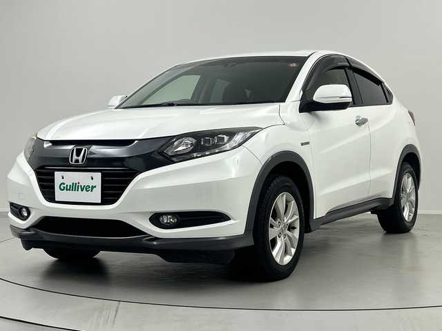 ホンダ ヴェゼル ハイブリッド X 福島県 2014(平26)年 12.6万km ホワイトオーキッドパール /禁煙車//４ＷＤ//シートヒーター//パドルシフト//純正ナビ/ワンセグTV・CD・DVD・BT//バックカメラ//アルミ付きサマータイヤ積込//クルーズコントロール//純正ＬＥＤライト//電動パーキングブレーキ//ステアリングリモコン//フォグライト//スマートキー2本//取扱説明書//保証書