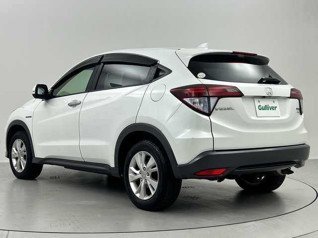 ホンダ ヴェゼル ハイブリッド X 福島県 2014(平26)年 12.6万km ホワイトオーキッドパール /禁煙車//４ＷＤ//シートヒーター//パドルシフト//純正ナビ/ワンセグTV・CD・DVD・BT//バックカメラ//アルミ付きサマータイヤ積込//クルーズコントロール//純正ＬＥＤライト//電動パーキングブレーキ//ステアリングリモコン//フォグライト//スマートキー2本//取扱説明書//保証書