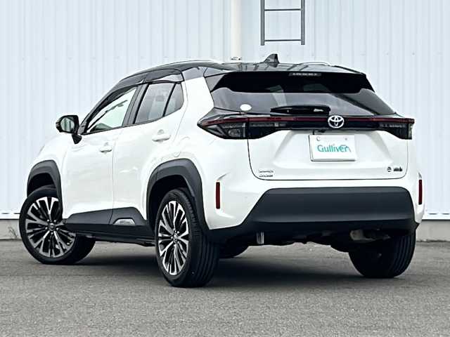 トヨタ ヤリスクロス ハイブリッド Z 愛媛県 2021(令3)年 2.1万km ブラックマイカ/ホワイトパールクリスタルシャイン 2トーン 純正ディスプレイナビ/Bluetooth/USB/ACP/AA/全方位カメラ/クルーズコントロール追従あり/パワーシート/ハーフレザー/前席シートヒーター/純正18インチAW/HUB/BSM/LEDヘッドライト/コーナーセンサー/フォグランプ/保証書/取扱説明書