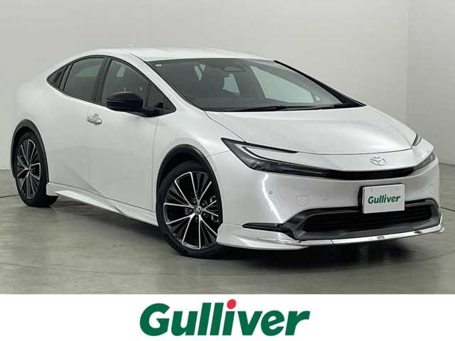 トヨタ プリウス Z 福岡県 2023(令5)年 3万km プラチナホワイトパールマイカ モデリスタエアロ　/純正１２．３型ＤＡナビ/フルセグTV　/全方位カメラ　/デジタルルームミラー　/ビルトインETC２．０　/トヨタセーフティセンス　/レーダークルーズコントロール　/コーナーセンサー　/衝突軽減ブレーキ　/レーンキープ　/ブラインドスポットモニター　/アクセル踏み間違い防止　/パーキングアシスト　/シートメモリー付きパワーシート　/シートベンチレーション／ヒーター　/ステアリングヒーター　/パワーバックドア/純１９インチアルミホイール