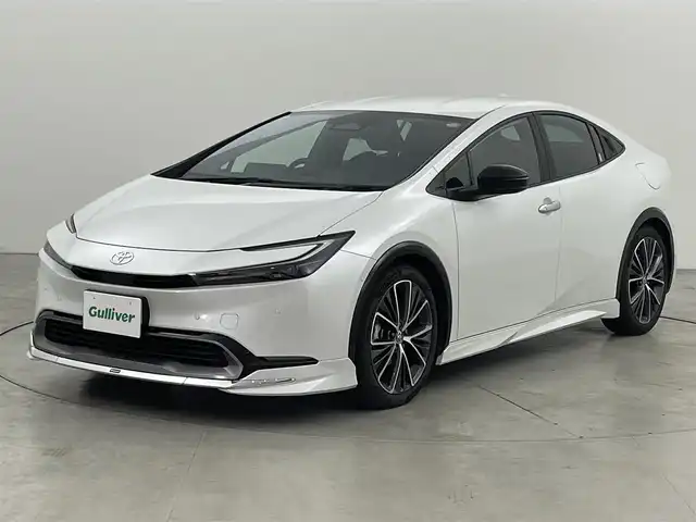トヨタ プリウス Z 福岡県 2023(令5)年 3万km プラチナホワイトパールマイカ モデリスタエアロ　/純正１２．３型ＤＡナビ/フルセグTV　/全方位カメラ　/デジタルルームミラー　/ビルトインETC２．０　/トヨタセーフティセンス　/レーダークルーズコントロール　/コーナーセンサー　/衝突軽減ブレーキ　/レーンキープ　/ブラインドスポットモニター　/アクセル踏み間違い防止　/パーキングアシスト　/シートメモリー付きパワーシート　/シートベンチレーション／ヒーター　/ステアリングヒーター　/パワーバックドア/純１９インチアルミホイール