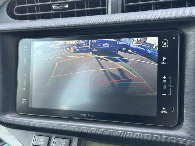 トヨタ アクア S 愛媛県 2012(平24)年 7.4万km ライムホワイトパールクリスタルシャイン 純正ナビ/フルセグTV/バックカメラ/ETC/純正AW/純正フロアマット/LEDヘッドライト/オートライト/スマートキー/プッシュスタート/シートヒーター/電格ミラー/禁煙車/ステアリングスイッチ