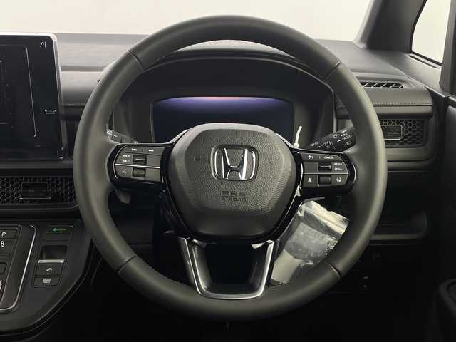 ホンダ ステップワゴン スパーダ eHEV 新潟県 2025(令7)年 0.1千km クリスタルブラックパール 15.6インチフリップダウンモニター/純正11.4インチナビ/　　フルセグ/CD/DVD/BT/バックカメラ/両側パワースライドドア/パワーバックドア/レーダークルーズコントロール/LEDオートライト/ハーフレザーシート/シートヒーター/純正16インチアルミホイール/ステアリングスイッチ/BSM/USBポート/パドルシフト/スマートキー